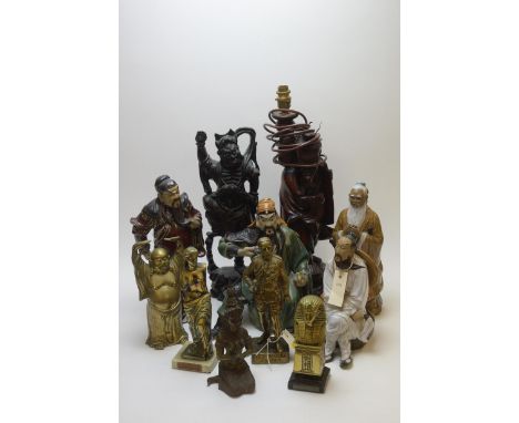 Mixed figurines, to include: a carved root Japanese mythical figure; a carved table lamp; four ceramic Japanese warriors; bra