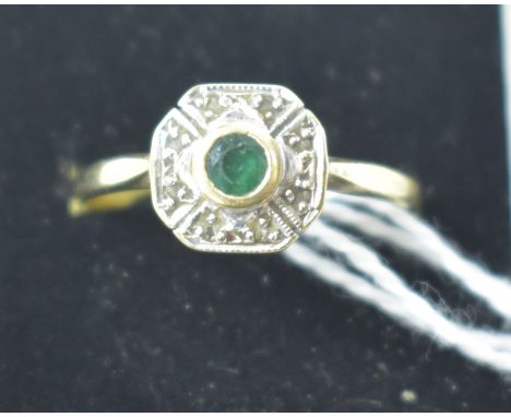 An early 20th Century emerald and diamond ring, on 9ct gold shank, ring size R.