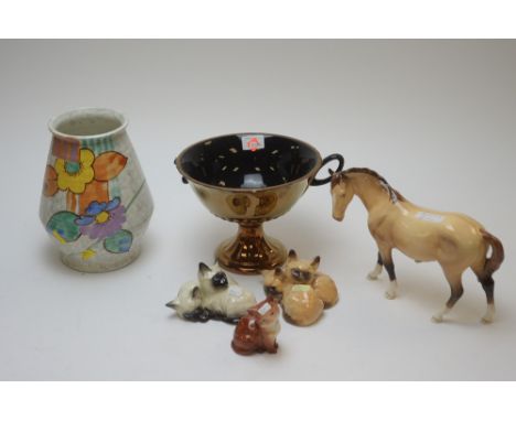 Beswick pottery, to include: a vase; a copper lustre tazza; a horse; and three cat ornaments.