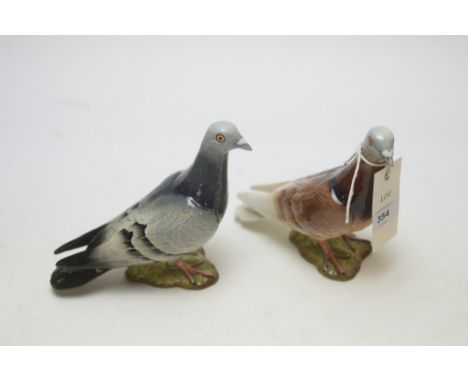 Two Beswick pigeon ornaments, one grey, one brown.