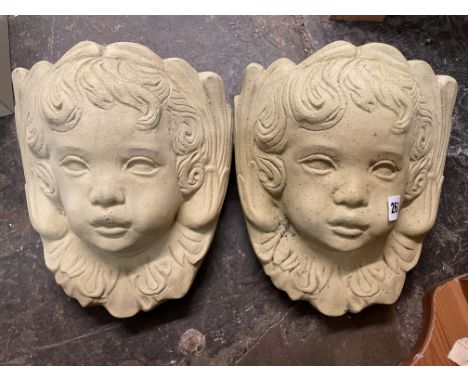 PAIR OF LIGHT STONEWORK CHERUB FACE WALL POCKETS