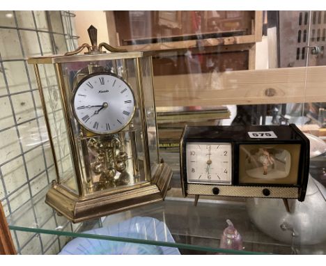 KUNDO ANNIVERSARY SIX PANE CLOCK AND A GERMAN NOVELTY ALARM CLOCK