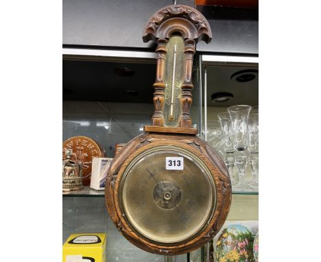 OAK CARVED ANEROID BAROMETER 