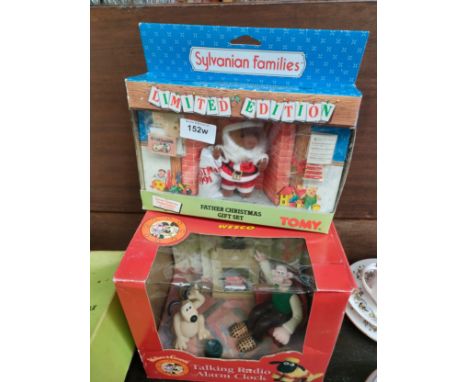 Wesco Wallace and gromit talking radio alarm clock together with Sylvanian family boxed toy . 