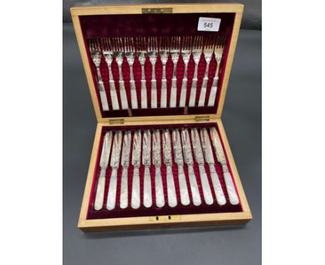 Boxed canteen of Mother of pearl handled fork and knife set. 