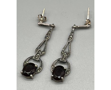 A Pair of Art Deco design silver, marcasite and garnet set earrings. 