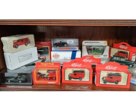 Shelf of boxed vehicle models includes dinky , British railways boxed model etc . 