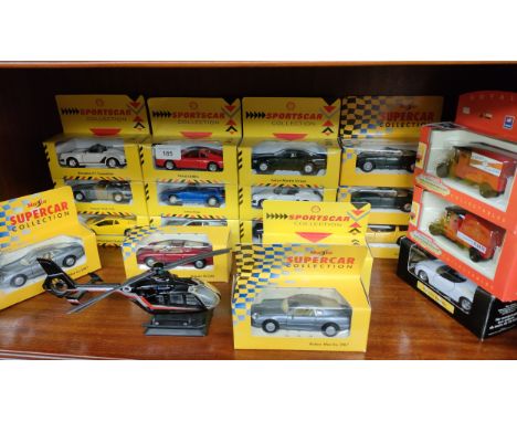 Shelf of sport car models and helicopter toy etc. 