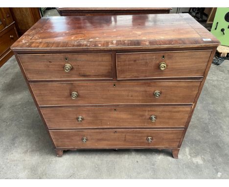 Georgian style chest, the rectangular top with inlay above two short drawers and three long drawers, raised on bracket feet [