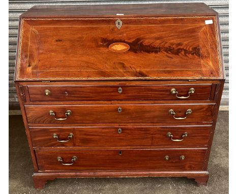 19th century bureau, the sloping fall with central shell inlay, opening to green material surface area and storage compartmen