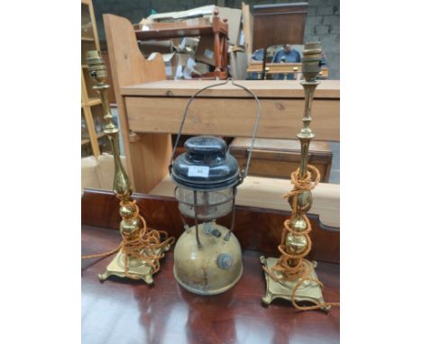 Old storm lamp together with pair of antique brass table lamps [Will not post] 