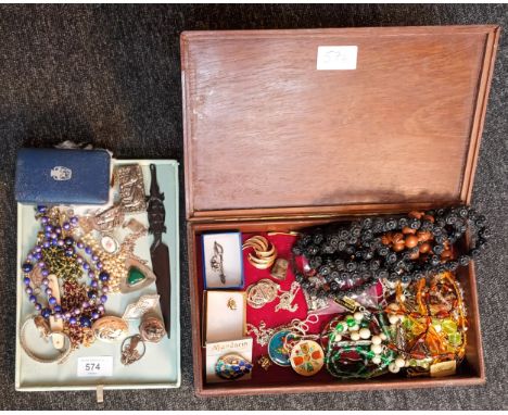 Two boxes containing a quantity of mixed silver and costume jewellery. Silver plated pill boxes, Silver cat pendants and chai