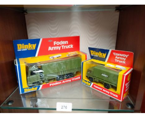 2 Boxed Dinky army vehicles includes folden army truck . 