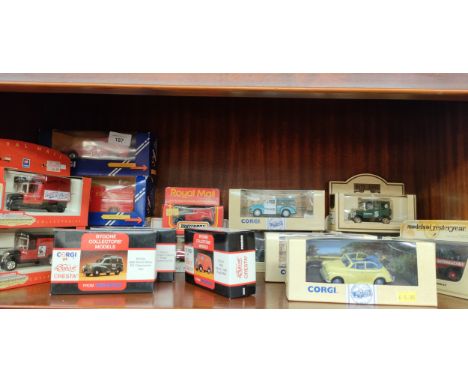 Shelf of models to include corgi police car etc . 