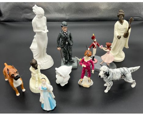 A Collection of collectable porcelain figures and animals, Royal Doulton Discovery figure HN 3428, RD Charlie Chaplin HN2771,