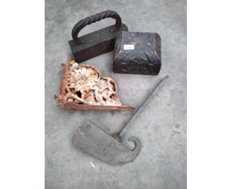 Selection of antique items to include cast wall shelf brackets, cast iron snooker flat iron and wooden carved block etc . 