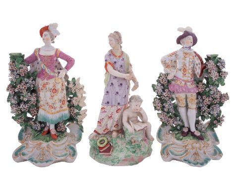 A pair of Derby porcelain bocage figures of the Ranelagh Dancers and a similar figure allegorical of Poetry the pair wearing 