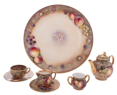 A Royal Worcester porcelain miniature tea set, comprising a circular tray, tea pot and cover, milk jug, sugar bowl, cup, sauc