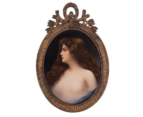 A Dresden porcelain oval plaque painted with a female half portrait in a diaphanous top, 14cm high, within a gilt brass easel