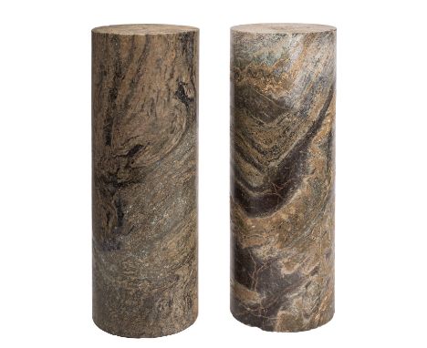 A pair of Connemara marble cylindrical columns, 18th / 19th century; presumably previously in architectural use; 38cm high, 1