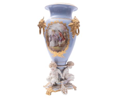 A large Limoges [Henri Ardant & Co.] porcelain vase of amphora form with lion mask ring handles and putti supports, painted w