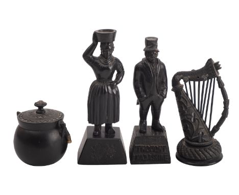 Four items of Victorian Irish carved bog oak souvenirware, 19th century; comprising a model of a harp, the body carved with s