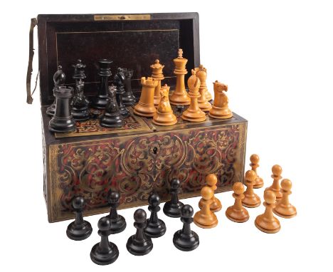 A Staunton pattern ebony and boxwood weighted chess set, probably by F.H.Ayers, circa 1900; one rook and one knight of each c