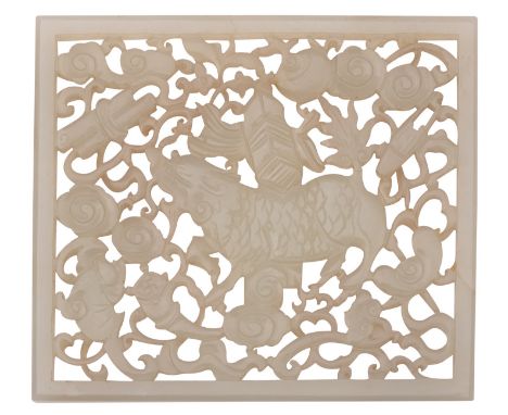 A Chinese celadon jade reticulated plaque carved with a mythical creature amongst cloud scrolls and auspicious objects, Qing 