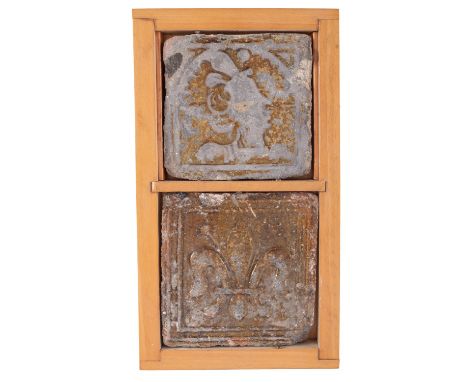 A Barnstaple pottery tile, modelled in high relief with a fleur de lys within a double line border under a honey glaze, late 