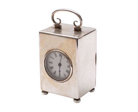 William Comyns & Sons, London a silver carriage clock the eight-day duration timepiece movement having a platform lever escap