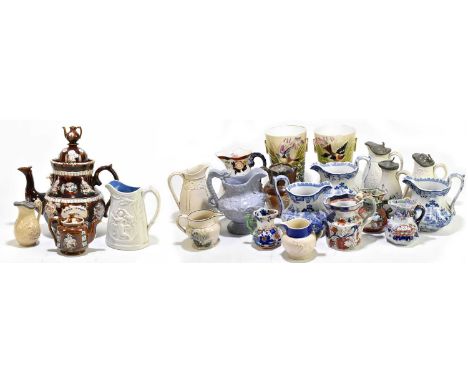A collection of seventeen 19th century relief moulded and transfer printed jugs, various dates and makers including three Mas