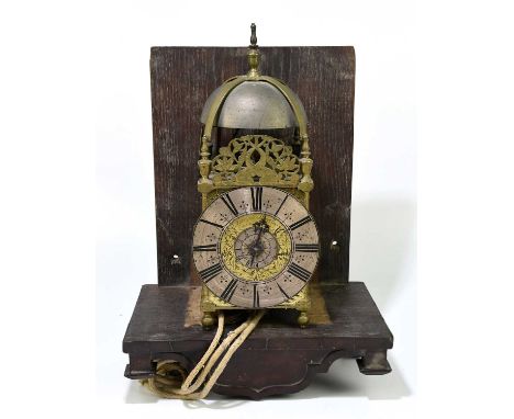 HENRICUS MONTLON LONDINI; a 17th century and later brass lantern clock, with engraved Roman numeral chapter ring and movement