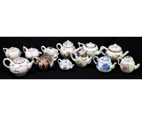 VICTORIA AND ALBERT MUSEUM; a collection of twelve porcelain teapots and covers after originals from the 18th and 19th centur