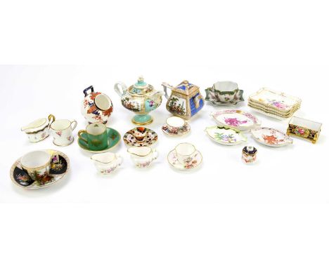 A collection of miniature ceramics and porcelain to include Herend, Derby, an Augustus Rex type teapot of square form, painte