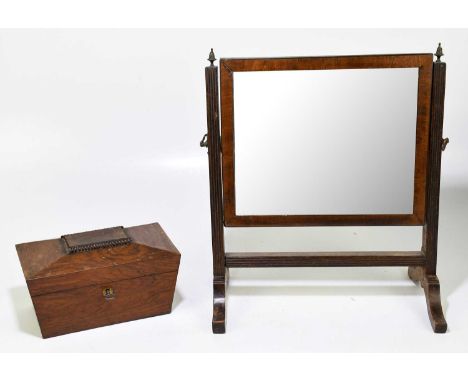 A mahogany tea caddy of sarcophagus form, together with a swing toilet mirror (2)