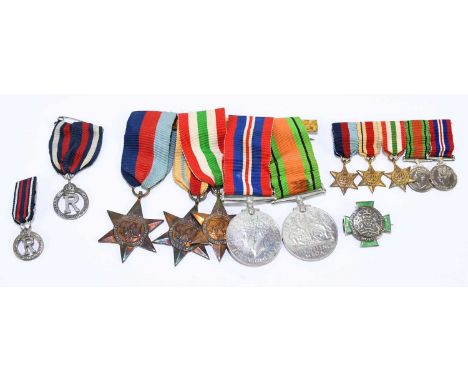 A WWII five piece medal group and miniatures comprising the 1939/45 Star, the Africa Star, the Italy Star, Defence Medal and 