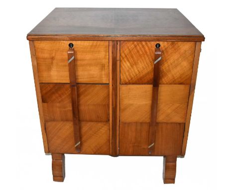 An Art Deco walnut chest with six short drawers, on serpentine legs, height 74cm, width 65cm, depth 52cm.Condition Report: A 
