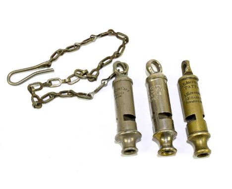 Three vintage police whistles, to include the Metropolitan patent, the Acme City whistle and the City Police or Fire whistle 