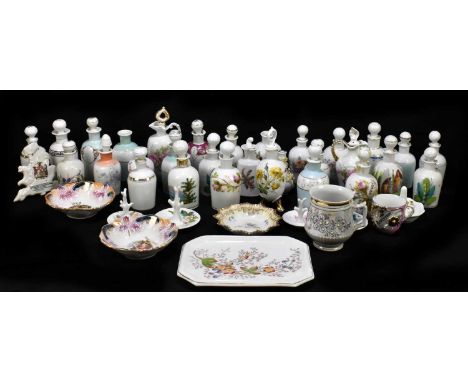A collection of mixed ceramics to include pin dishes, crested ware, a ring tree, ceramic bottles, etc.