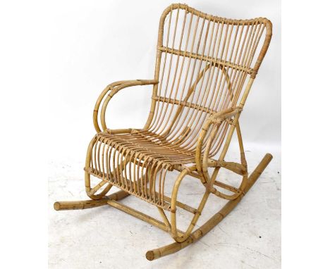 A vintage wicker rocking chair.