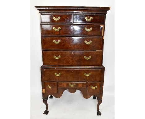 An 18th century and later walnut chest on stand, the upper with two short and three graduated long drawers on stand with an a