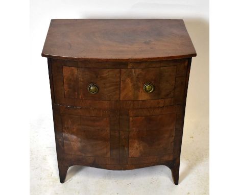 A 19th century mahogany bowfront commode in the form of a chest of drawers, height 70cm, width 60cm, depth 40cm.