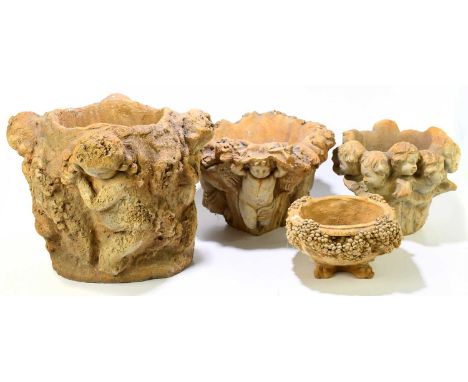 Four contemporary reconstituted cherubic decorated planters of varying sizes, height of largest 35cm.Condition Report: The sm