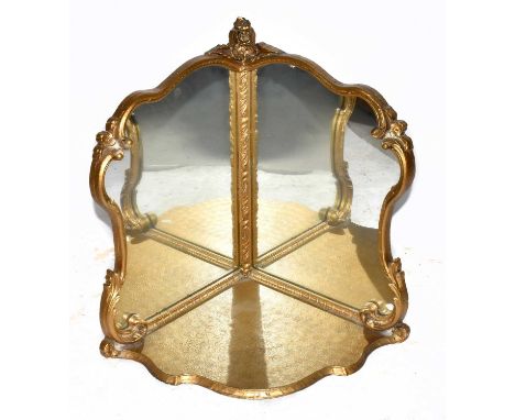 A decorative gilt mirrored corner shelf, in 18th century style, height 60cm.