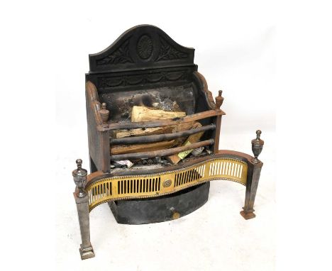 A cast iron and brass fire grate with cast iron back and pierced front, height 78cm.