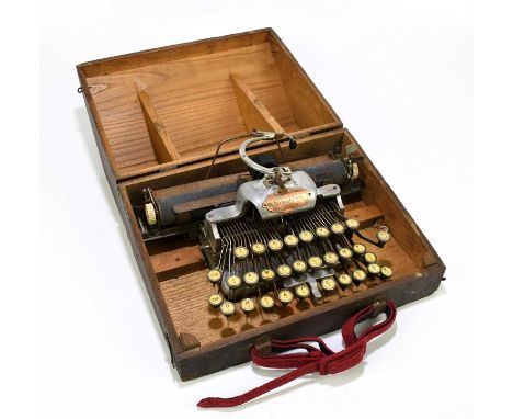 BLICK; a US made aluminium feather weight typewriter, in an oak case.