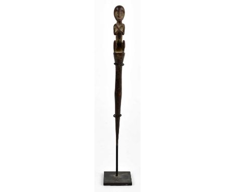 A Dayak People, Borneo figural spike on custom built metal stand, height including stand 24.5cm.Provenance: private collectio