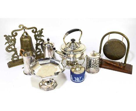 A small quantity of assorted metalware to include two table gongs, a small selection of silver plate to include a tea kettle 