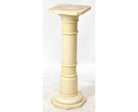 A modern alabaster effect resin jardinière stand, height 76cm.
 
