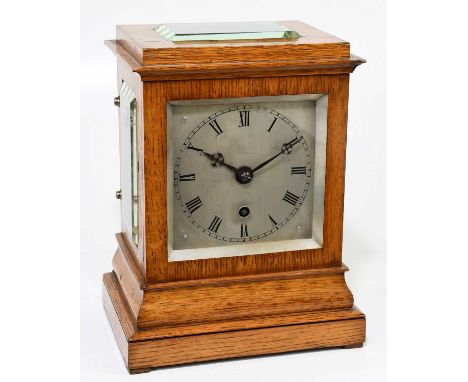 A 19th century oak cased four glass bracket clock, the silvered dial set with Roman numerals and fusee movement, height 25cm,